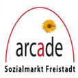 arcade Sozialmarkt Freistadt - roter Bogen mit einer kleinen Sonnenblume